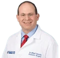 Dr. Mikel Daniels